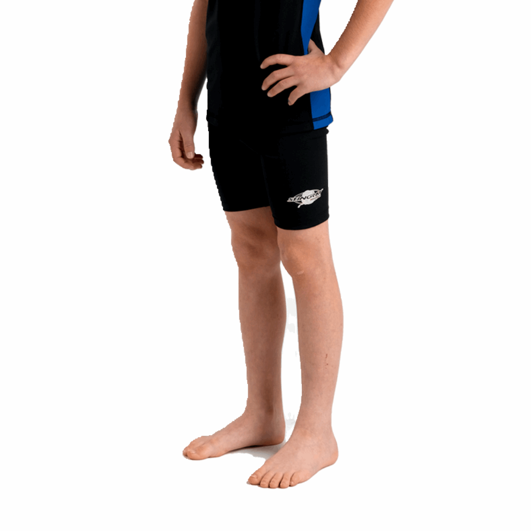 Boy/girl wearing the black Stingray Kids' Unisex Swim Shorts UPF 50+. These swimming trunks provide the best UV sun protection for swimming, water activities and outdoor play.