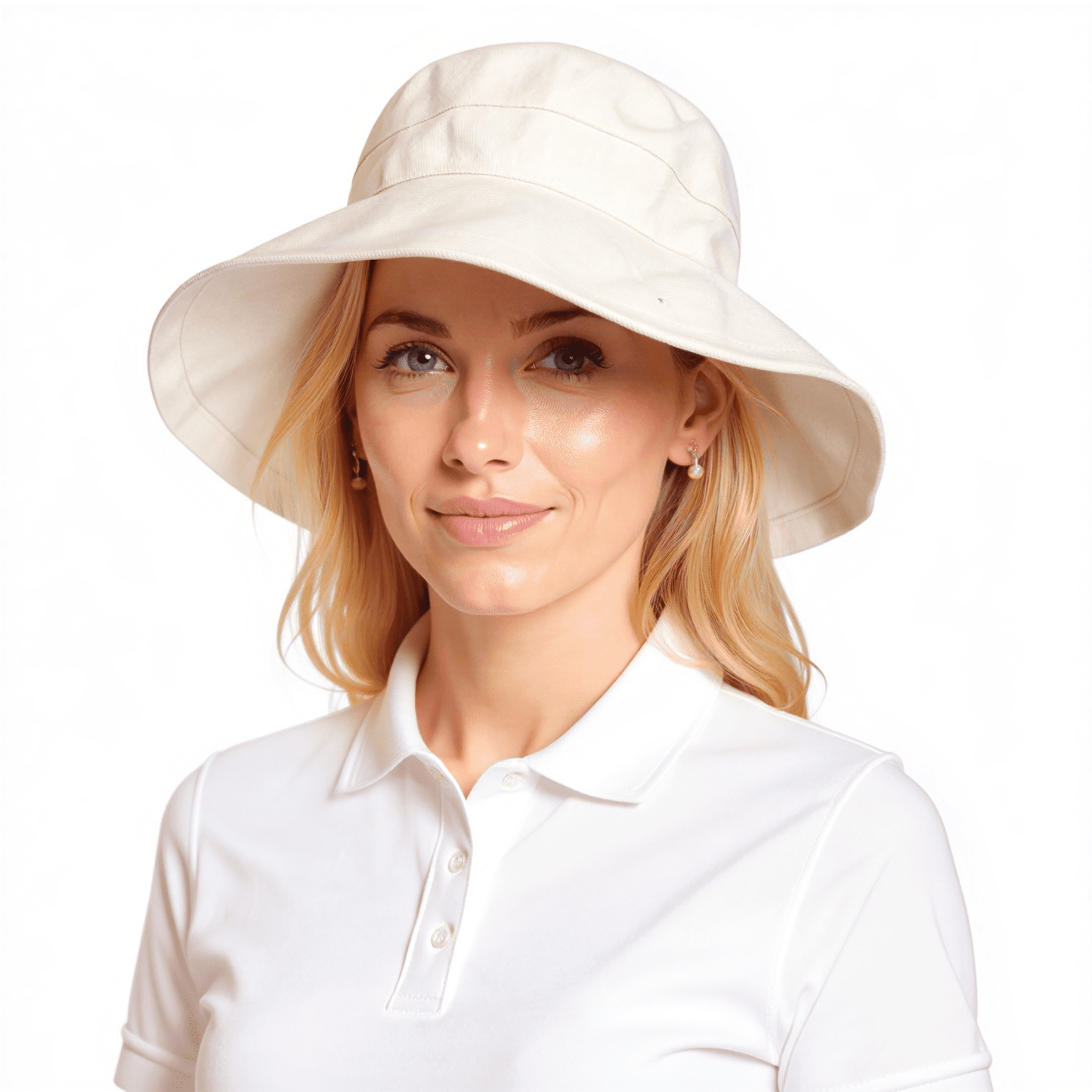 Side on model wearing white Stingray Women's Sun Hat with 4-inch wide brim and UPF 50+ sun protection. Fully-lined 100% cotton wide-brimmed sun hat with adjustable interior drawstring.