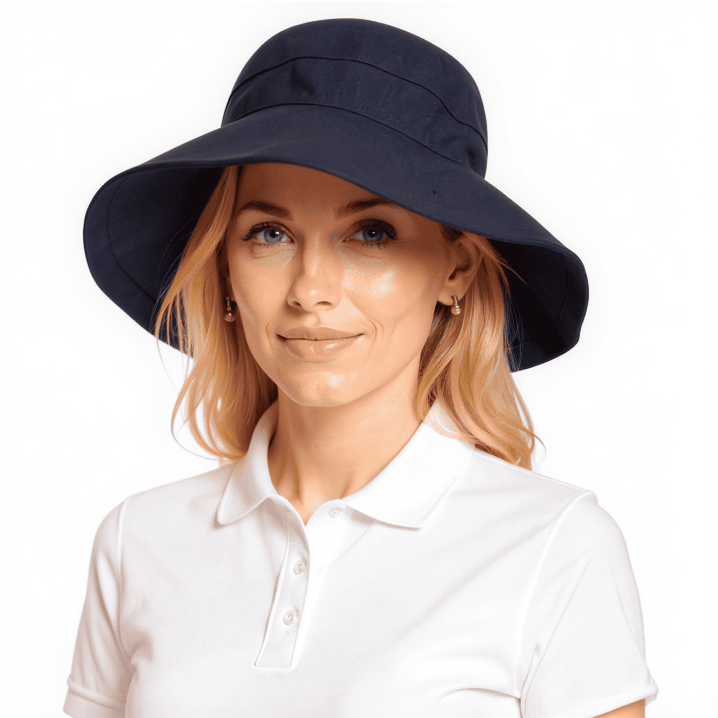 Side on model wearing navy Stingray Women's Sun Hat with 4-inch wide brim and UPF 50+ sun protection. Fully-lined 100% cotton wide-brimmed sun hat with adjustable interior drawstring.