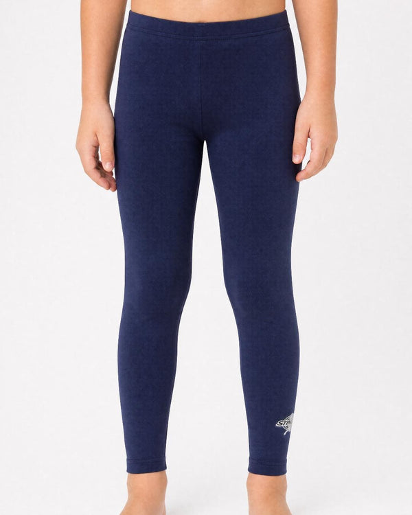 12 year old wearing navy blue UV swim leggings UPF 50+ on a white background