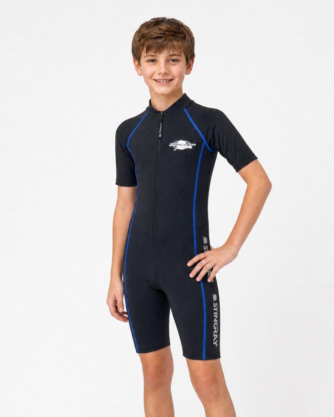 14 year old boy wearing a black short sleeve uv sunsuit on a white background