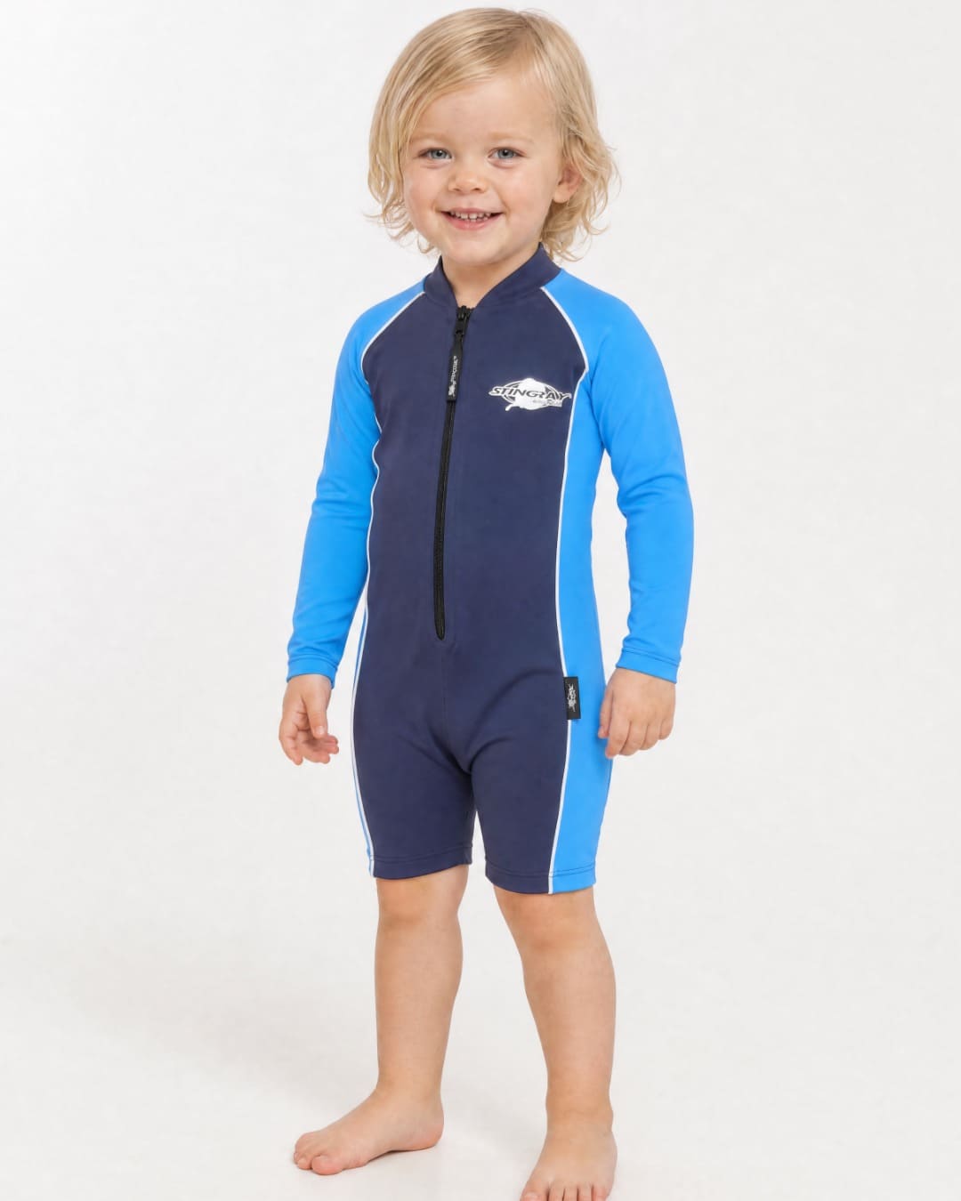 2 year old wearing a long sleeve UV swimsuit UPF 50+ - navy azure