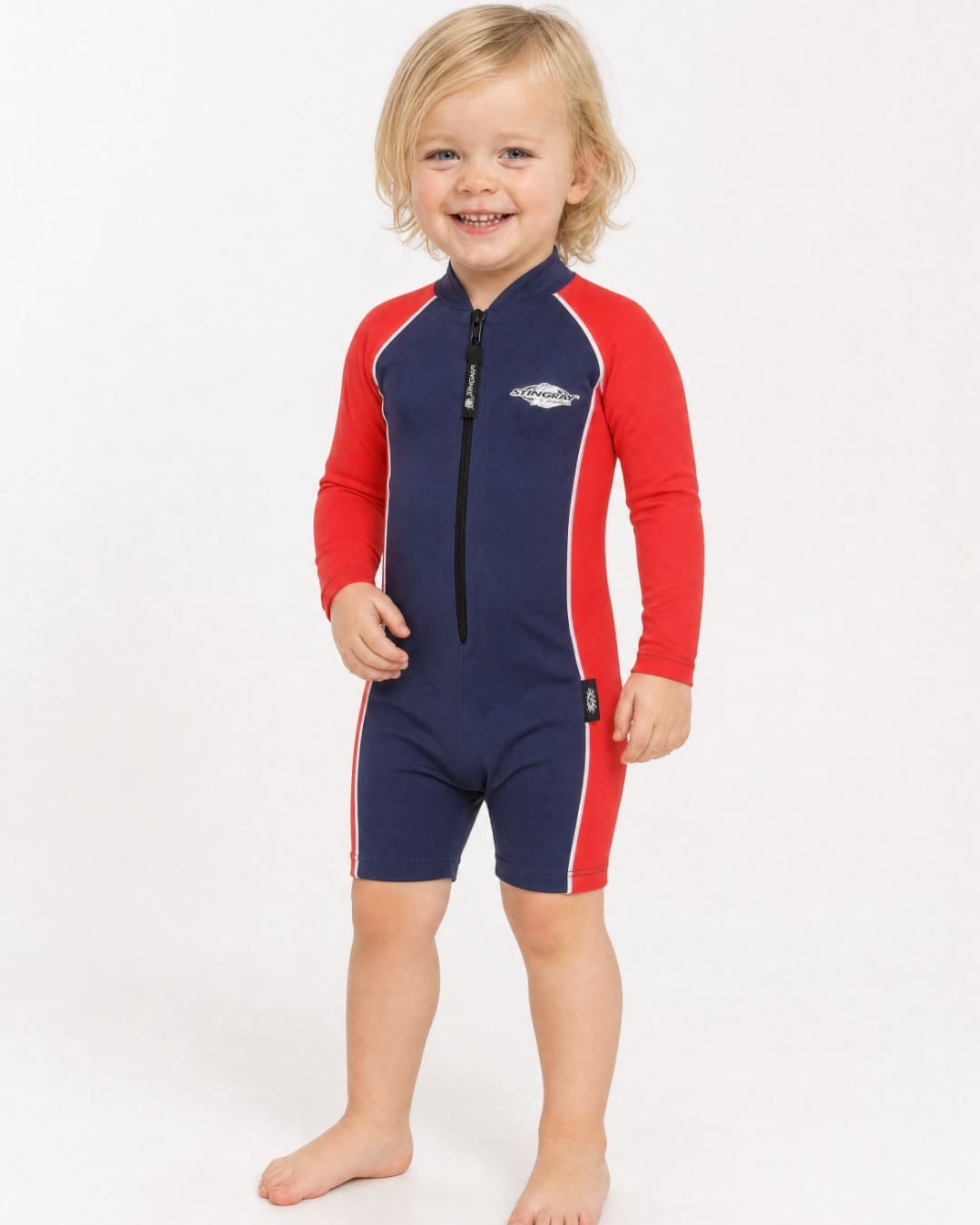 2 year old wearing a long sleeve UV swimsuit UPF 50+ - navy red