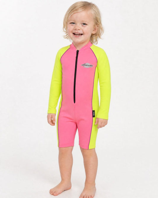 2 year old wearing a long sleeve UV swimsuit UPF 50+ - pink yellow