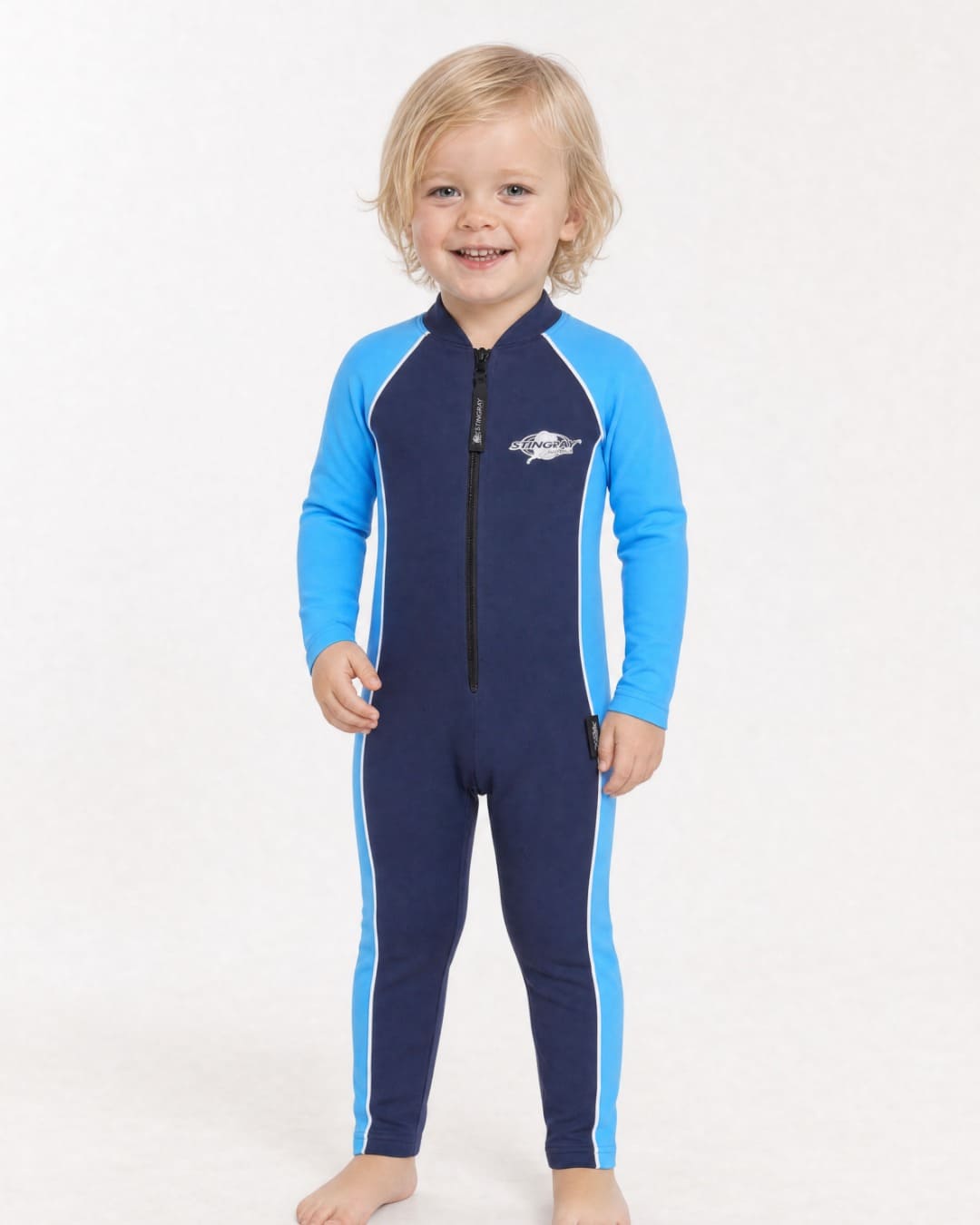 2 year old child/toddler wearing a full-body navy and azure UV swimsuit UPF 50+ on a white background