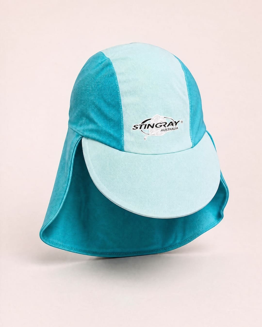Baby legionnaire cap in studio - teal
