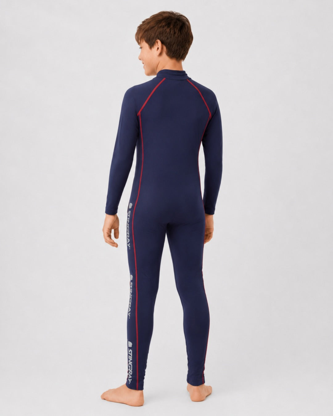 Back of 14 Year Old Boy in Full Body Sunsuit - Navy Red Stitch