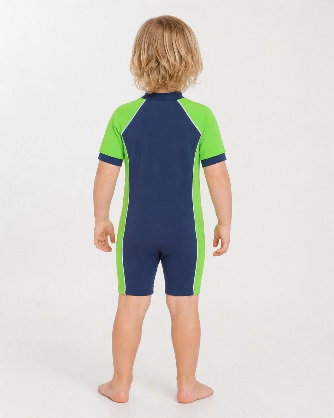 Back of 2 year old toddler wearing short sleeve UV sunsuit - navy green