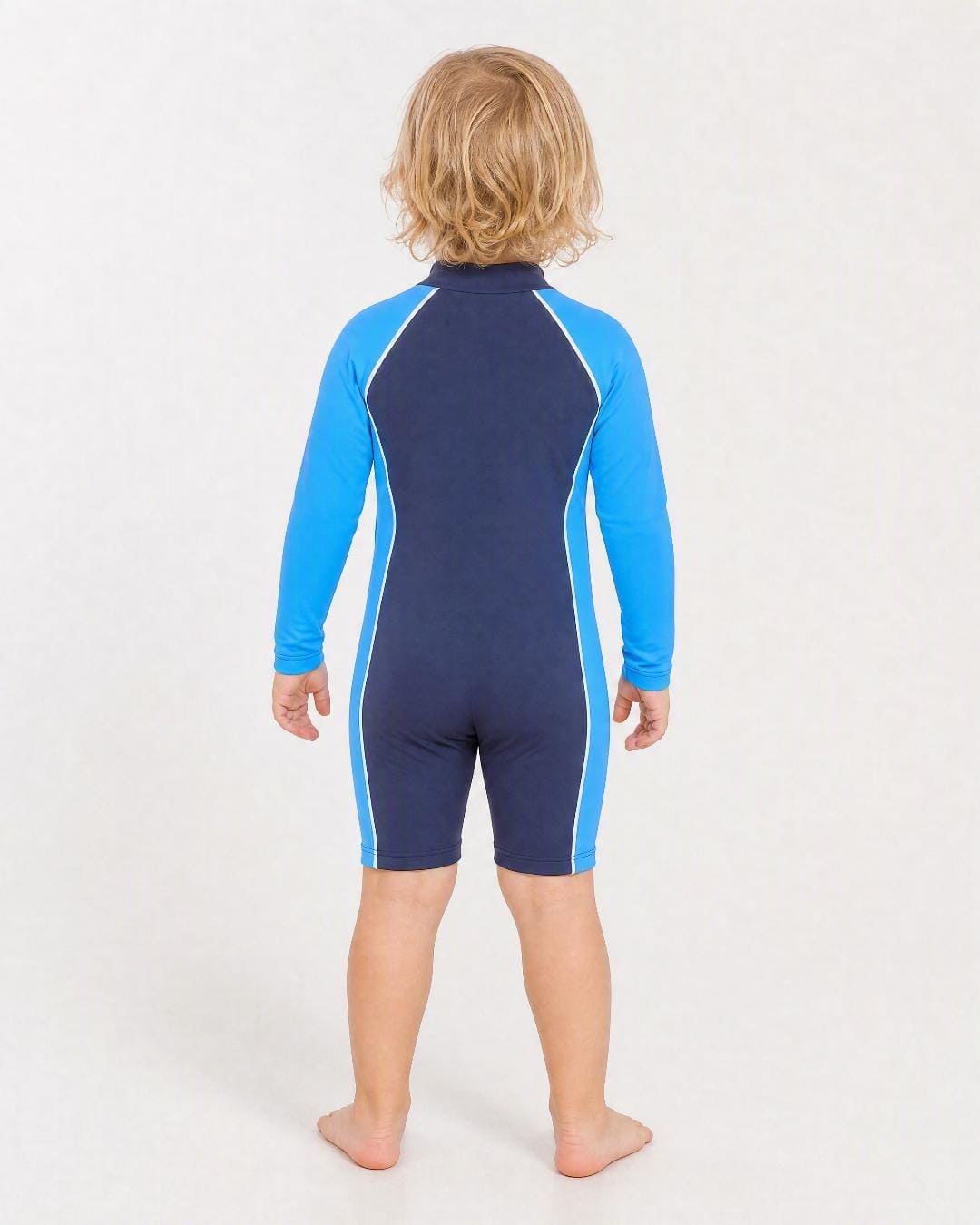 Back of 2 year old wearing a long sleeve UV swimsuit UPF 50+ - navy azure