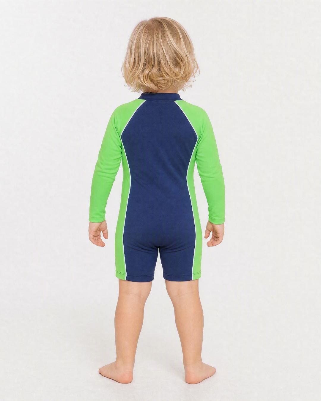 Back of 2 year old wearing a long sleeve UV swimsuit UPF 50+ - navy green