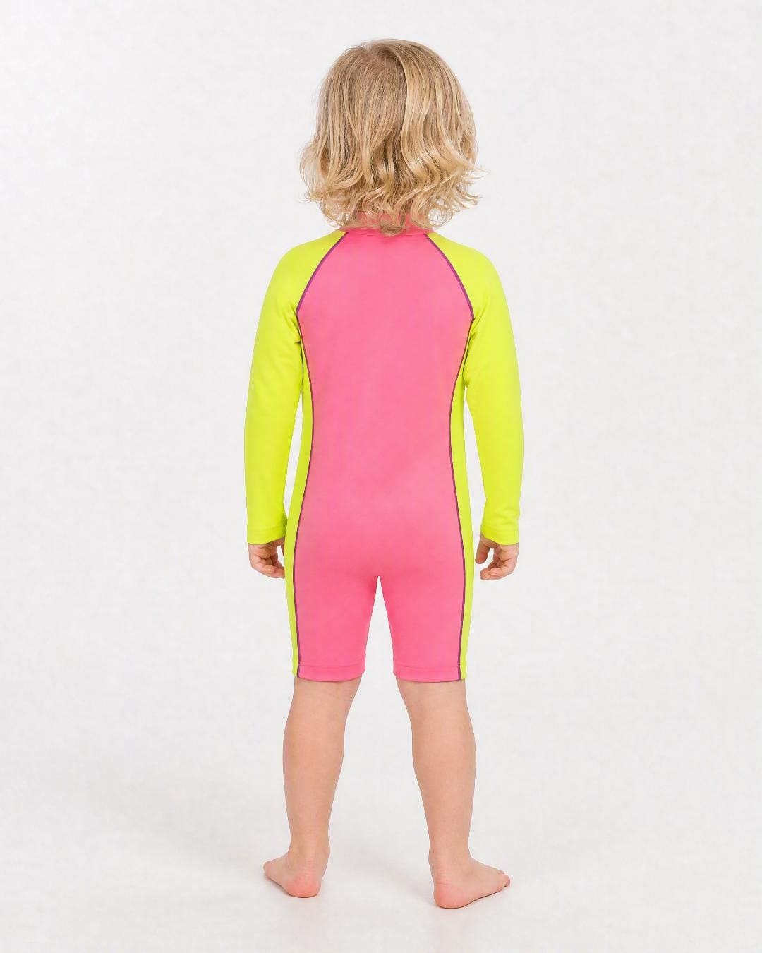 Back of 2 year old wearing a long sleeve UV swimsuit UPF 50+ - pink yellow