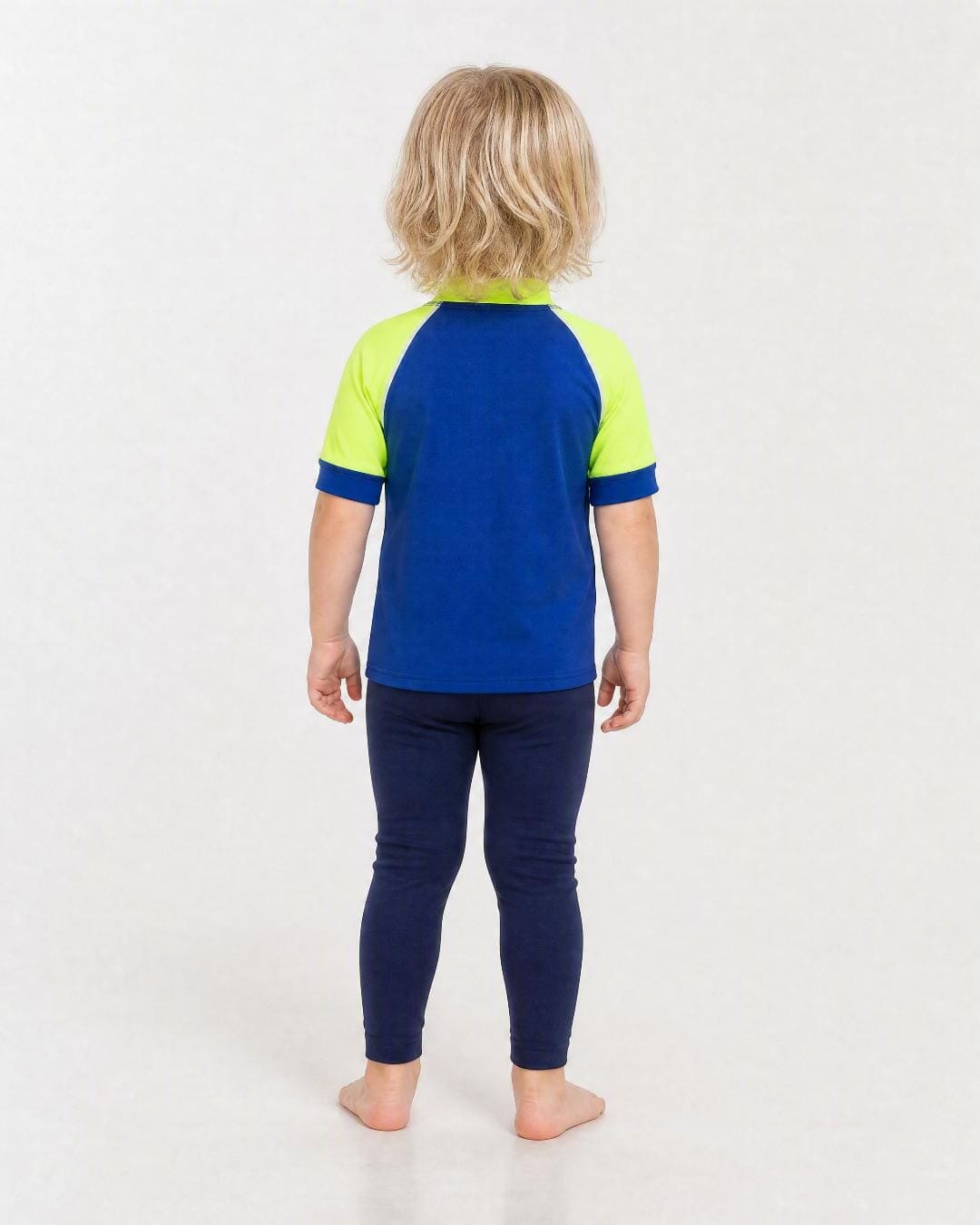 Back of 2 year old wearing short sleeve uv rash vest UPF 50+ - blue and yellow