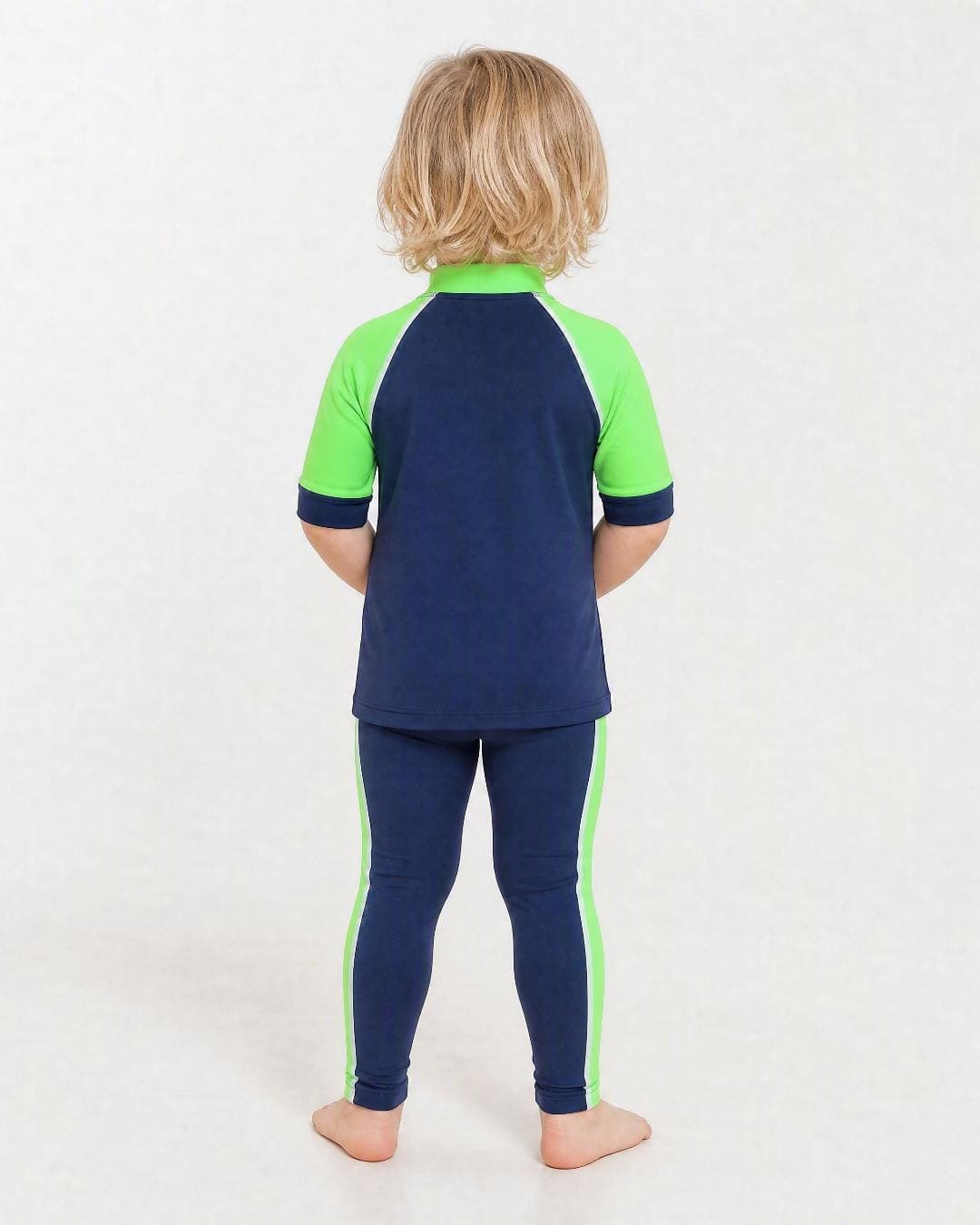 Back of 2 year old wearing short sleeve uv rash vest UPF 50+ - navy and green