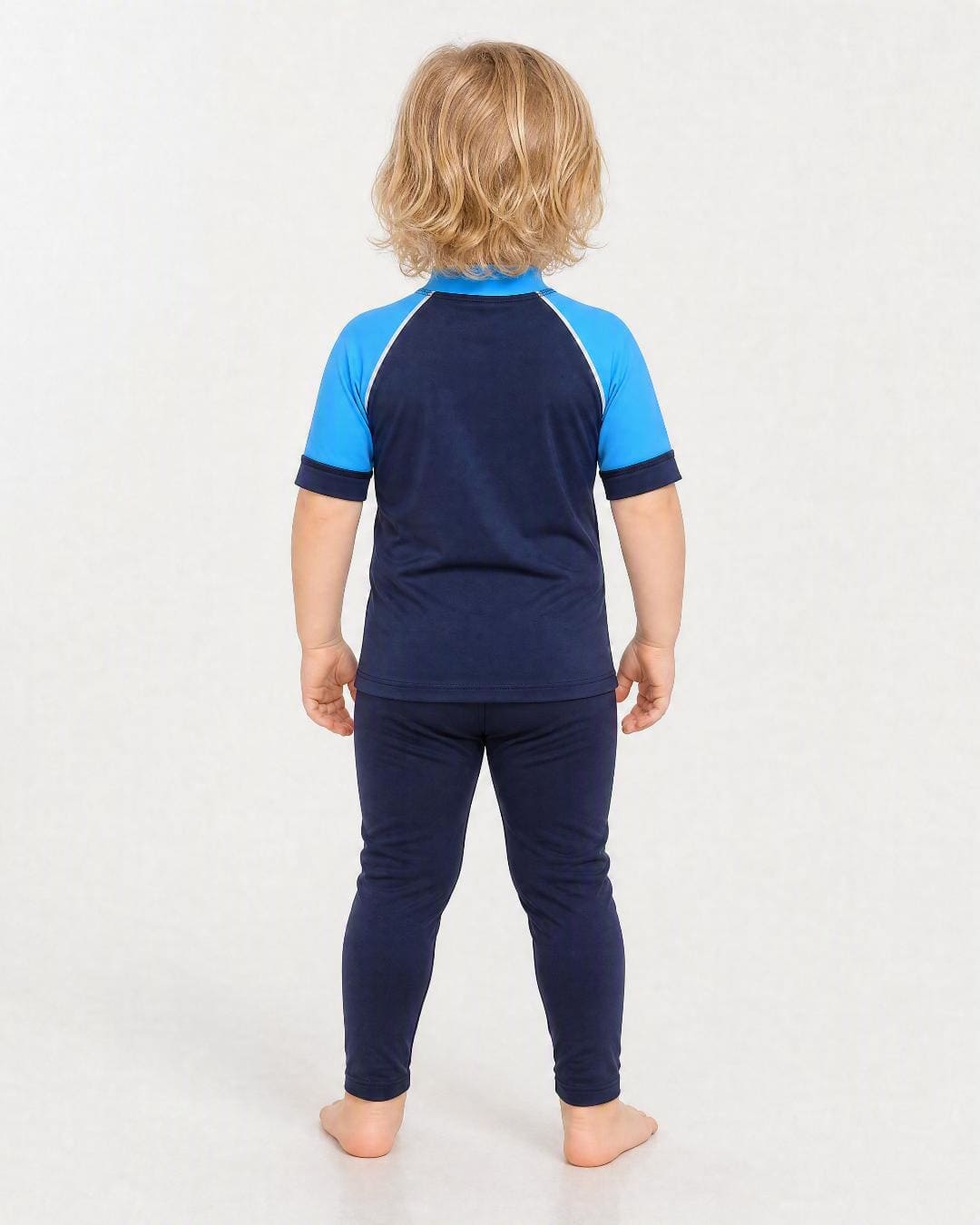Back of 2 year old wearing short sleeve uv rash vest UPF 50+ - navy azure