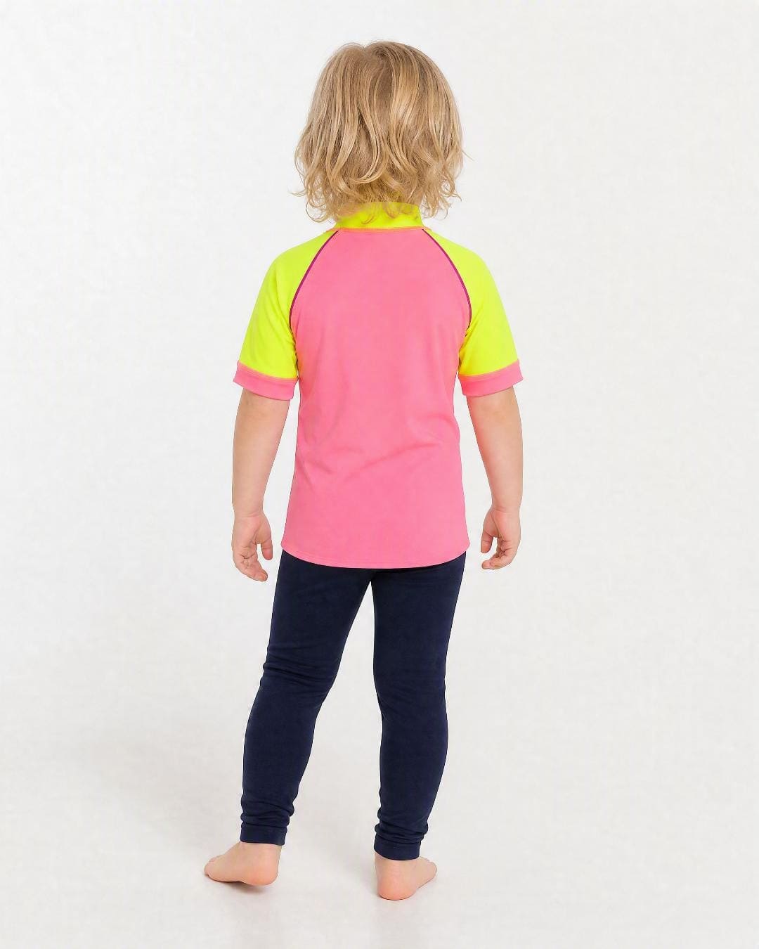Back of 2 year old wearing short sleeve uv rash vest UPF 50+ - pink and yellow