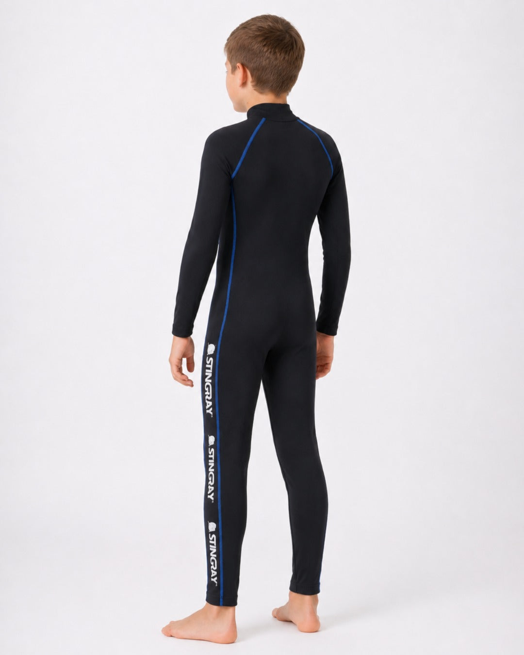 Back of 8 Year Old Boy in Full Body Sunsuit - Black Blue Stitch