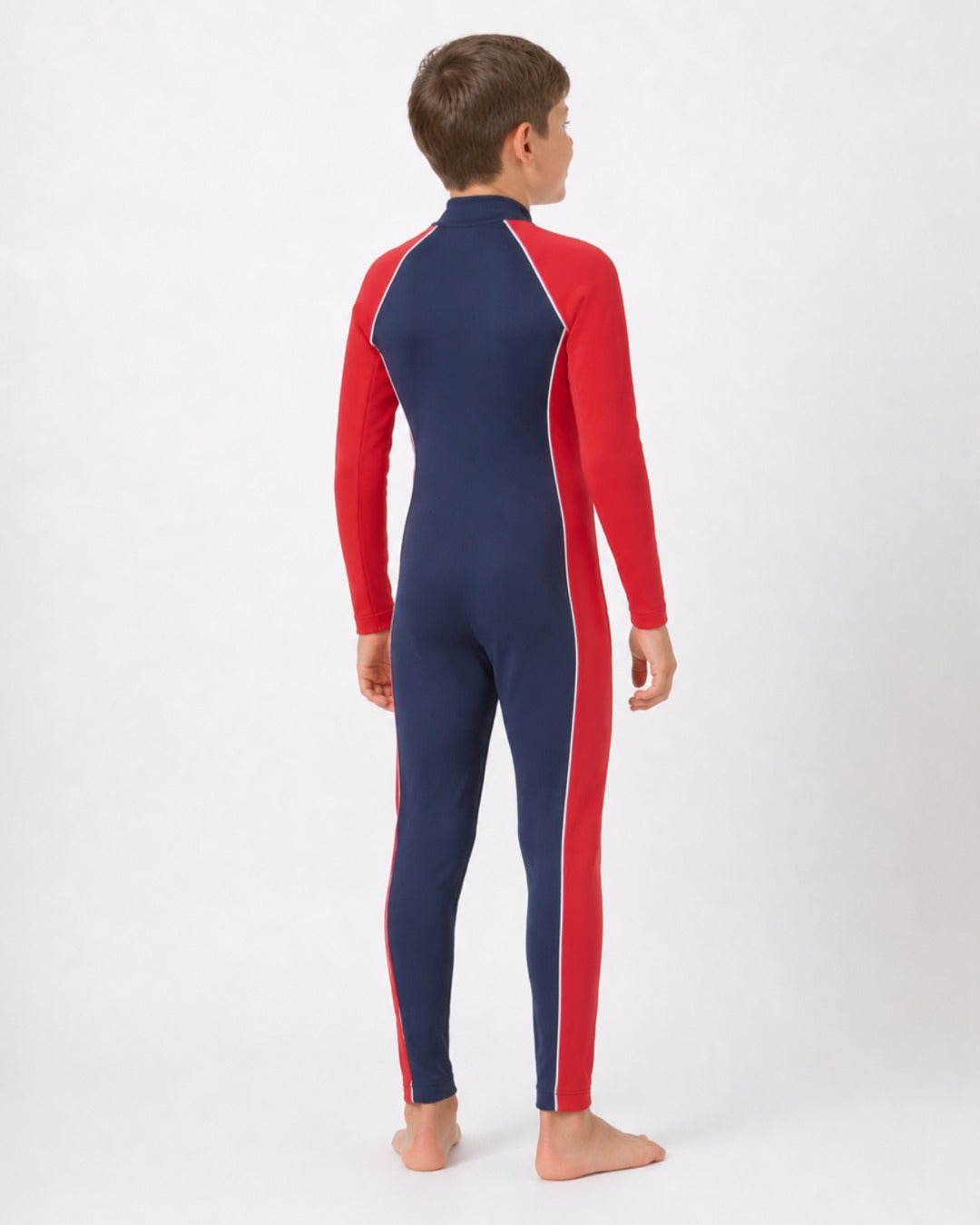 Back of 8 Year Old Boy in Full Body Sunsuit - Navy Red