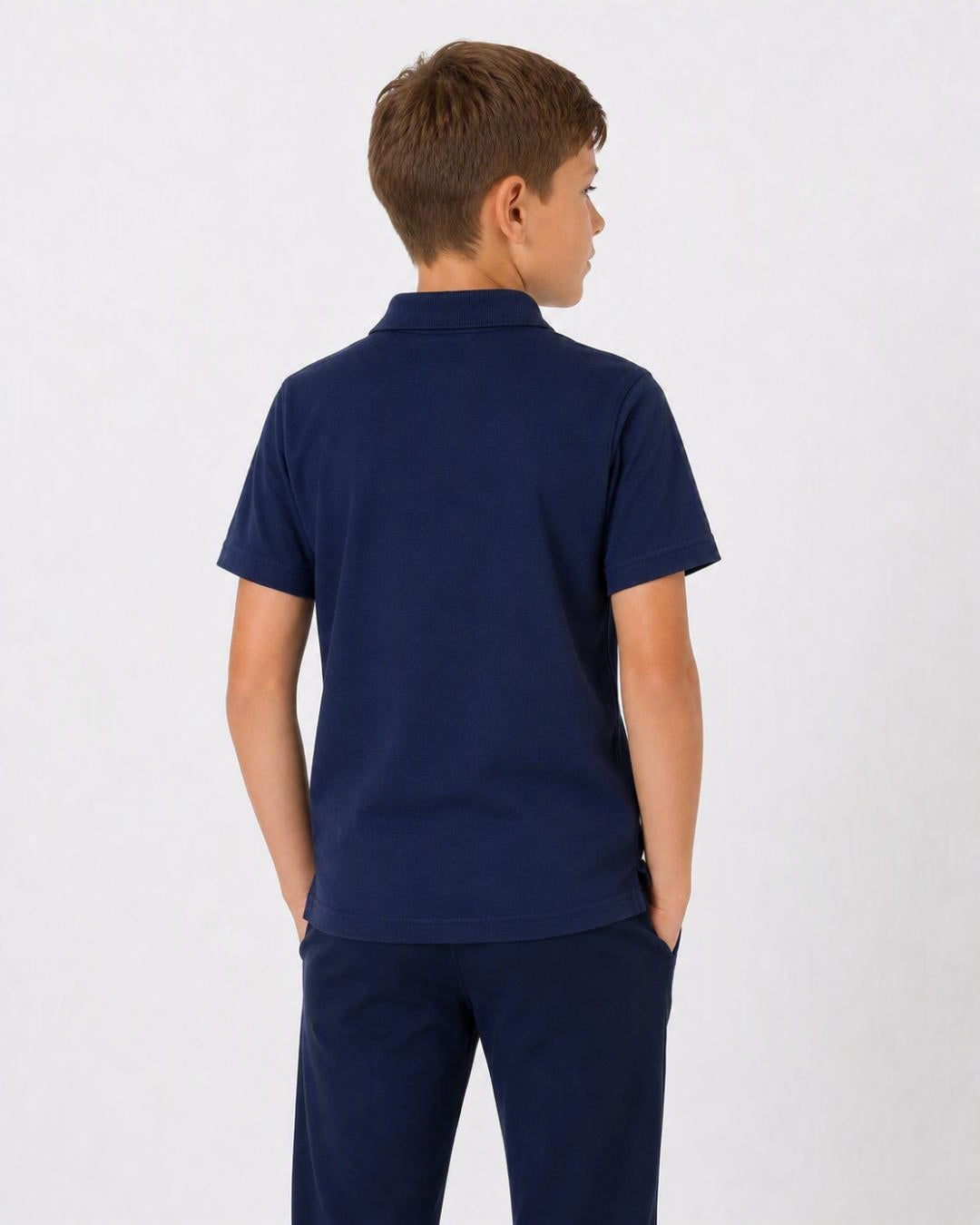 Back of 8 Year Old Wearing Short Sleeve Polo Shirt - Navy