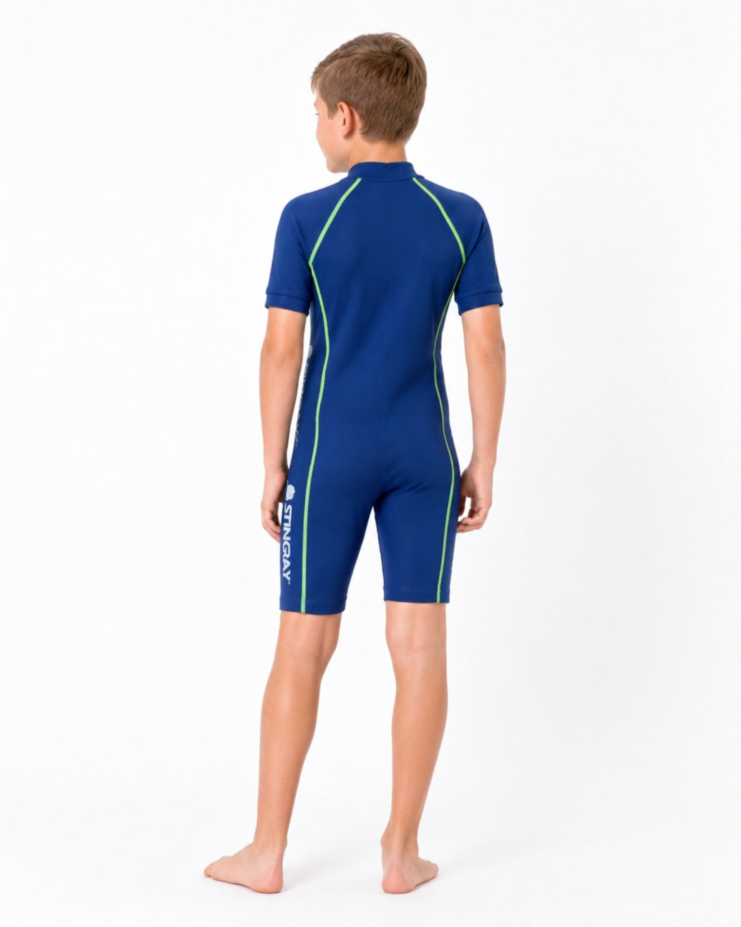 Back of 8 year old boy wearing short sleeve UV swimsuit UPF 50+ - blue