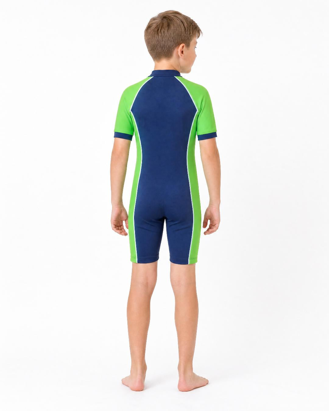 Back of 8 year old boy wearing short sleeve UV swimsuit UPF 50+ - navy green