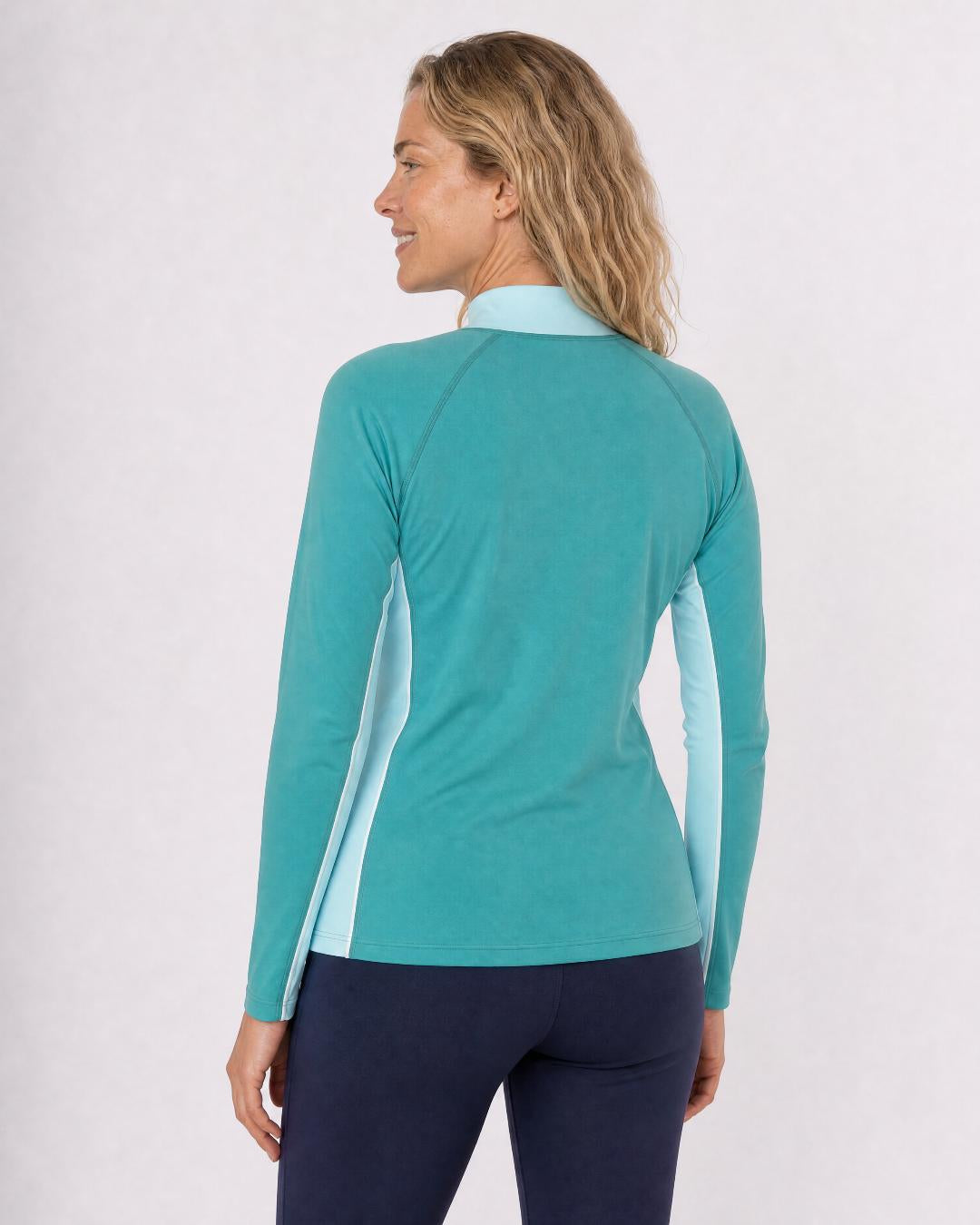 Back of Woman Wearing Long Sleeve UV Rash Shirt UPF 50+ in Aqua Teal