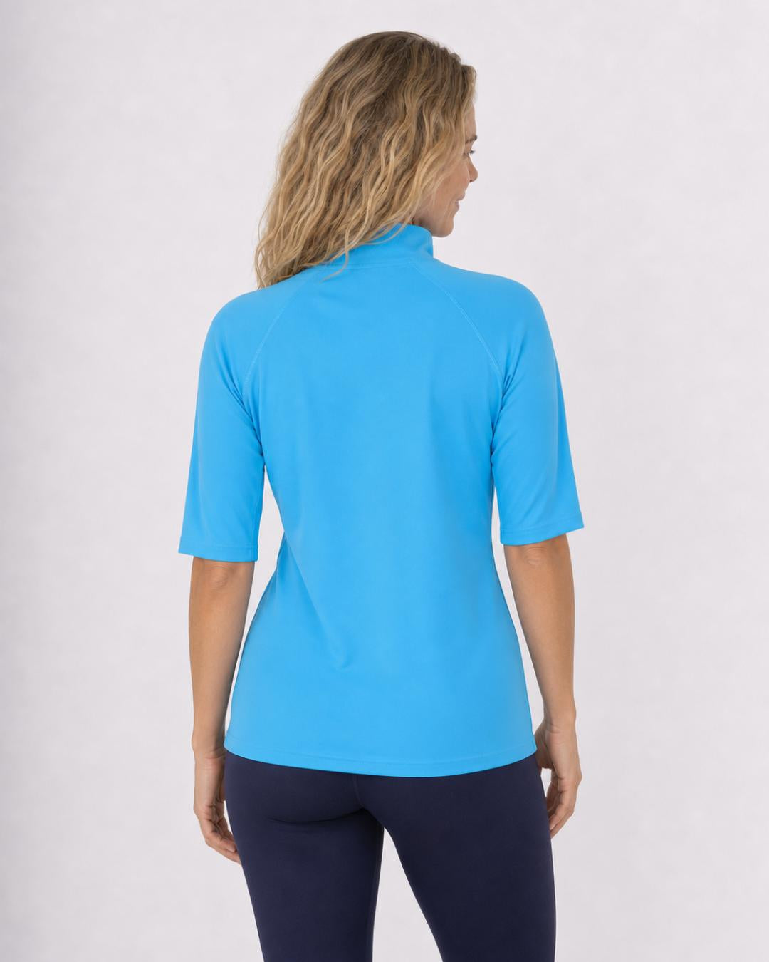 Back of Woman Wearing Short Sleeve UV Rash Shirt UPF 50+ in Azure