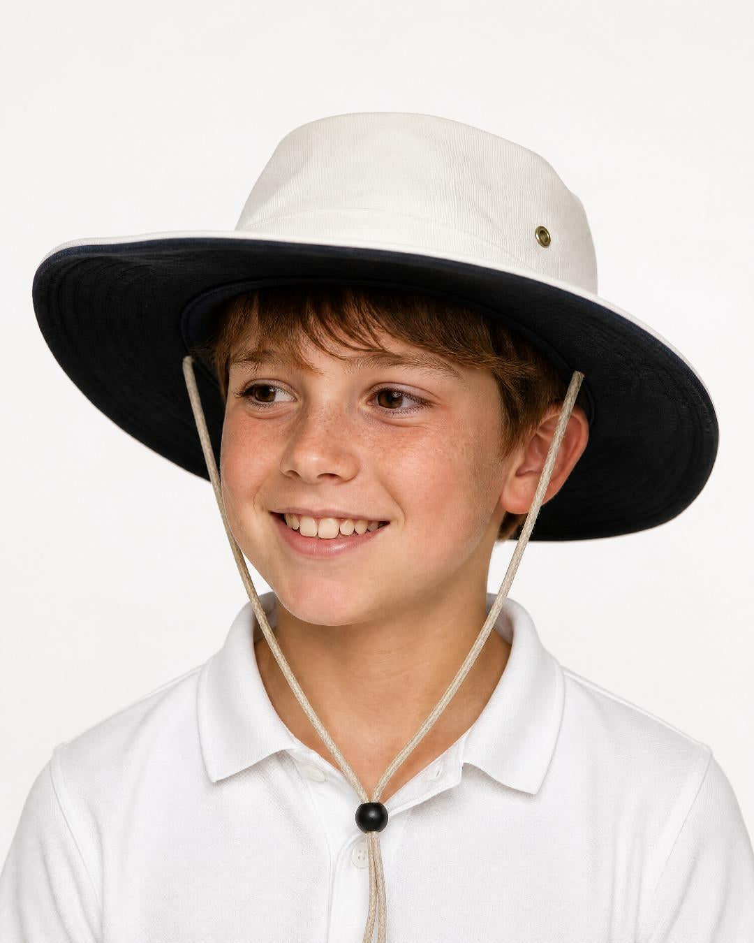 Boy wearing UV cricket hat UPF 50+