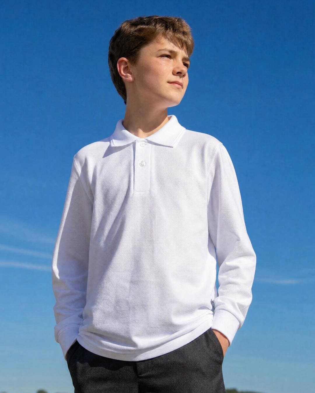 Lifestyle of 10 Year Old Boy Wearing Long Sleeve UV Polo Shirt - White
