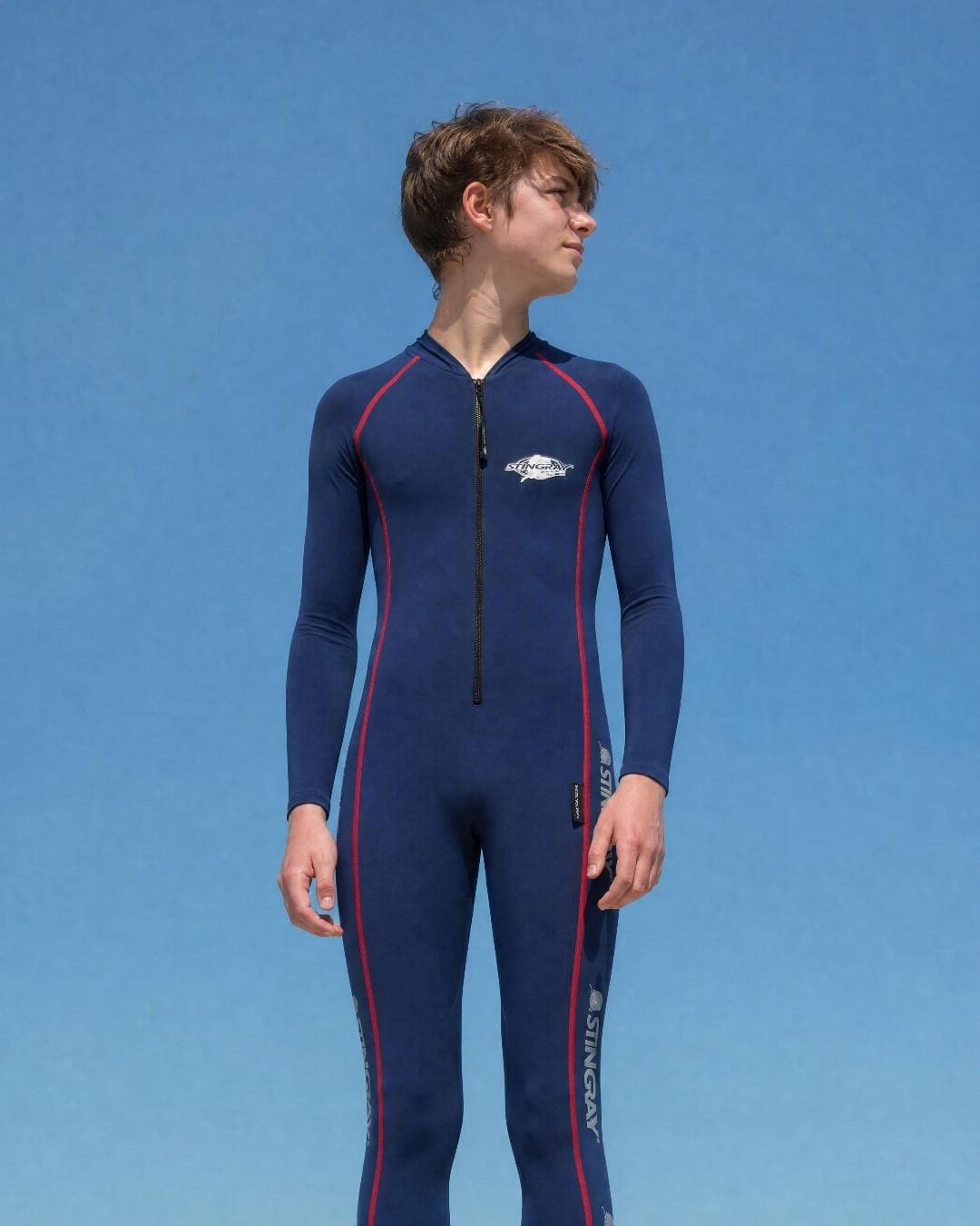 Lifestyle of 12 Year Old Boy in Full Body Sunsuit - Navy Red Stitch