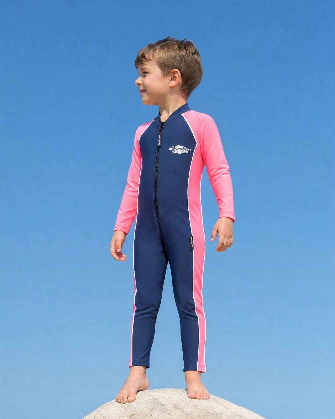 Lifestyle of 6 Year Old Boy in Full Body Sunsuit - Navy Pink