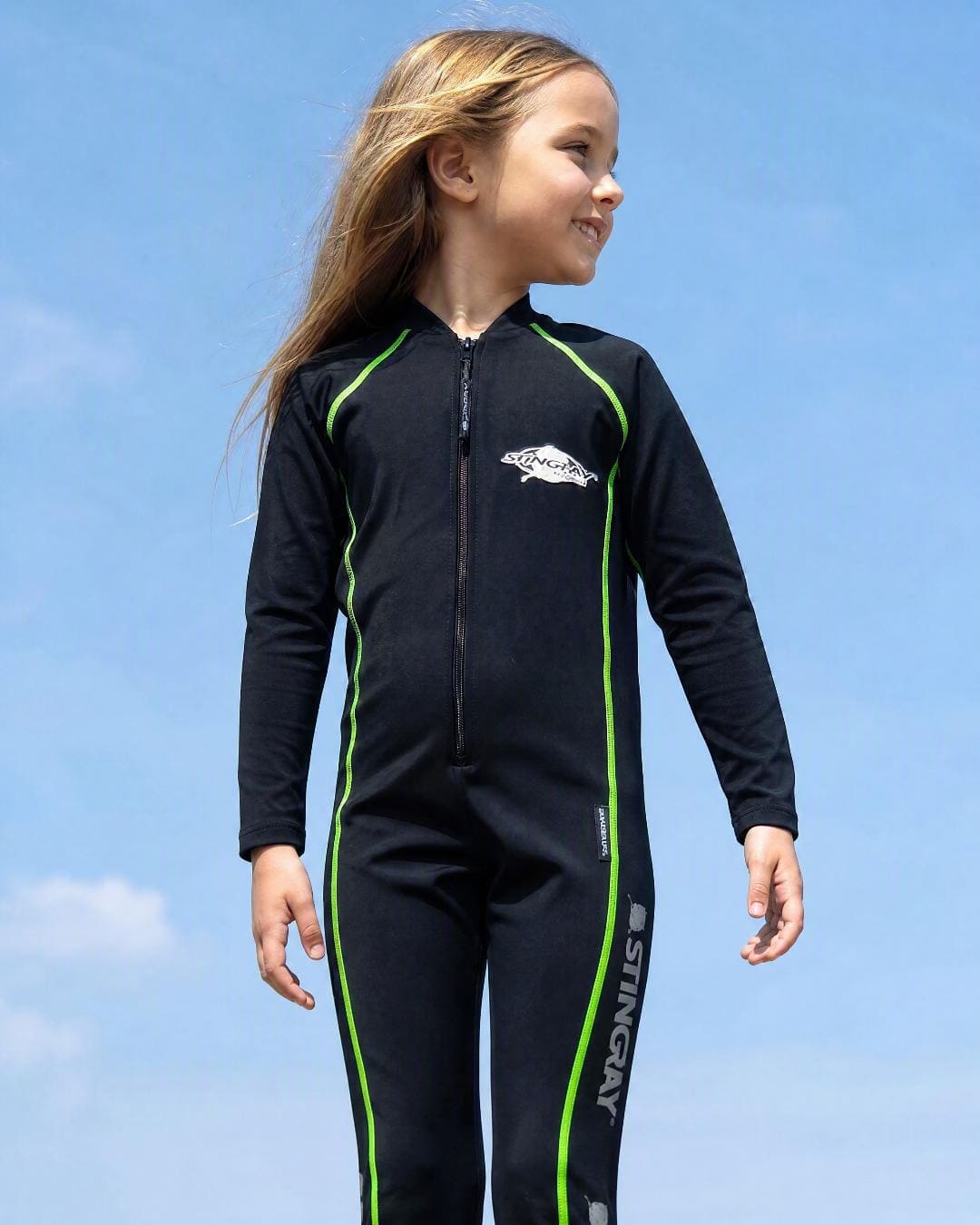 Lifestyle of 6 Year Old Girl in Full Body Sunsuit - Black Green Stitch