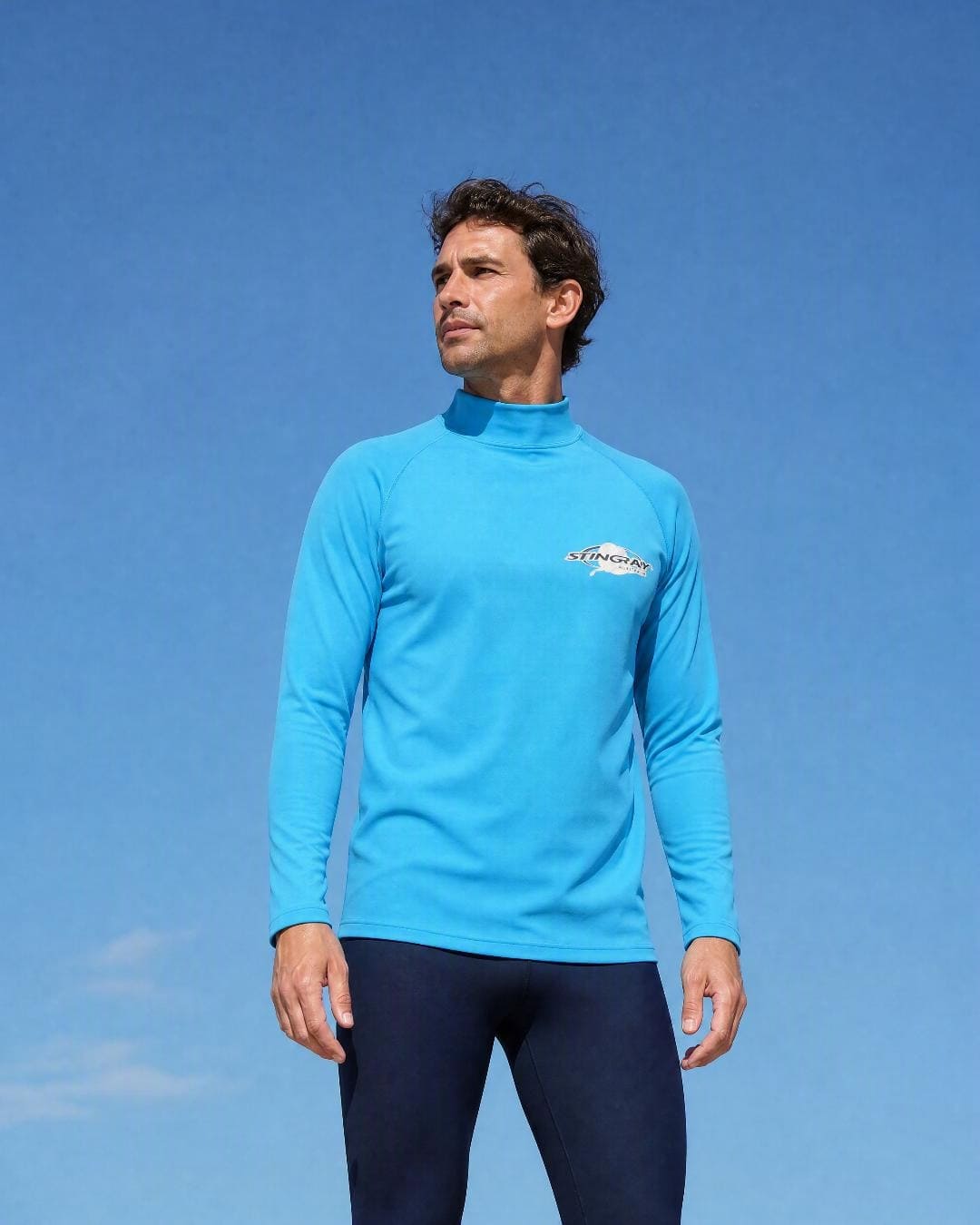 Lifestyle of Man Wearing Long Sleeve UV Rash Shirt UPF 50+ in Azure