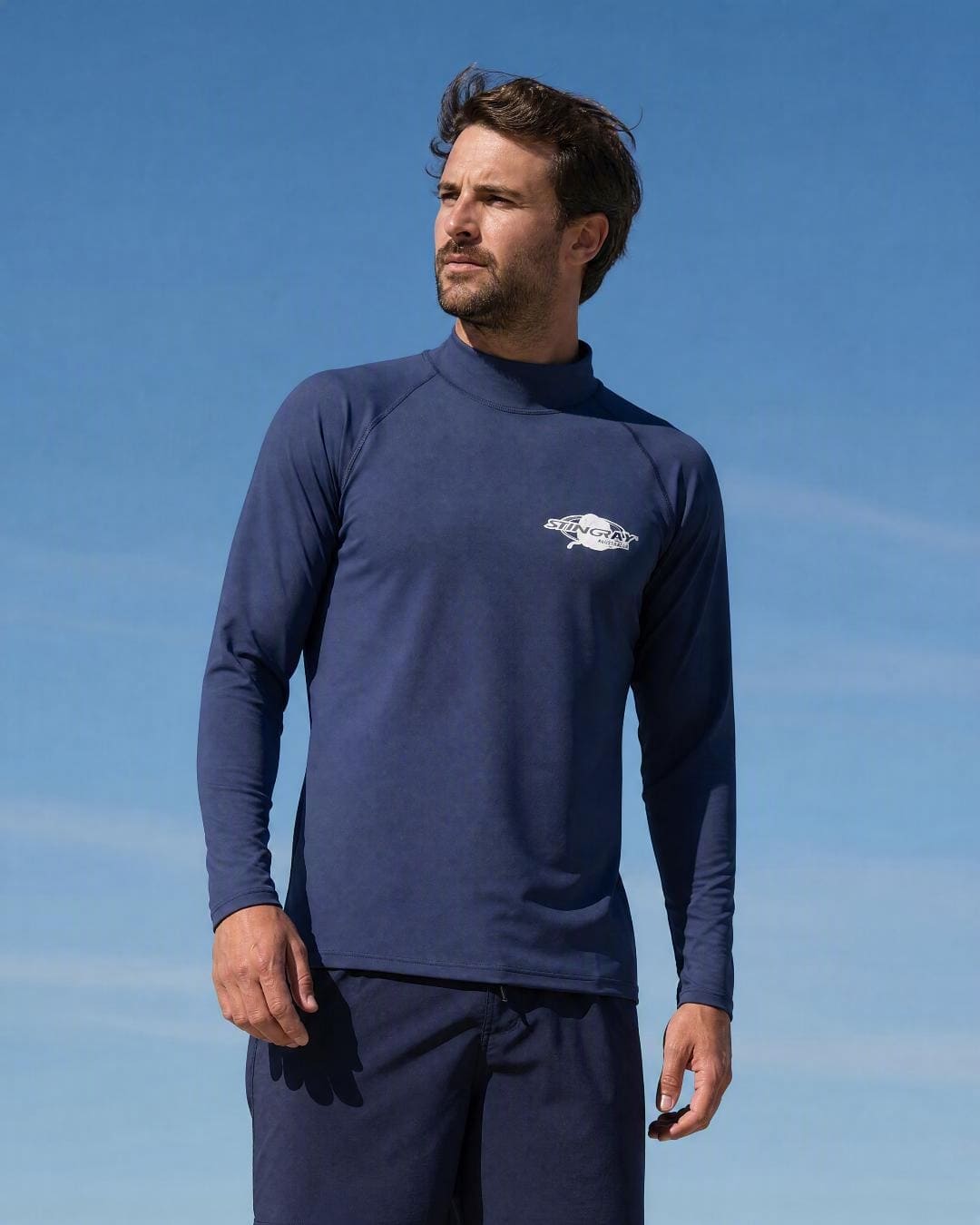 Lifestyle of Man Wearing Long Sleeve UV Rash Shirt UPF 50+ in Navy
