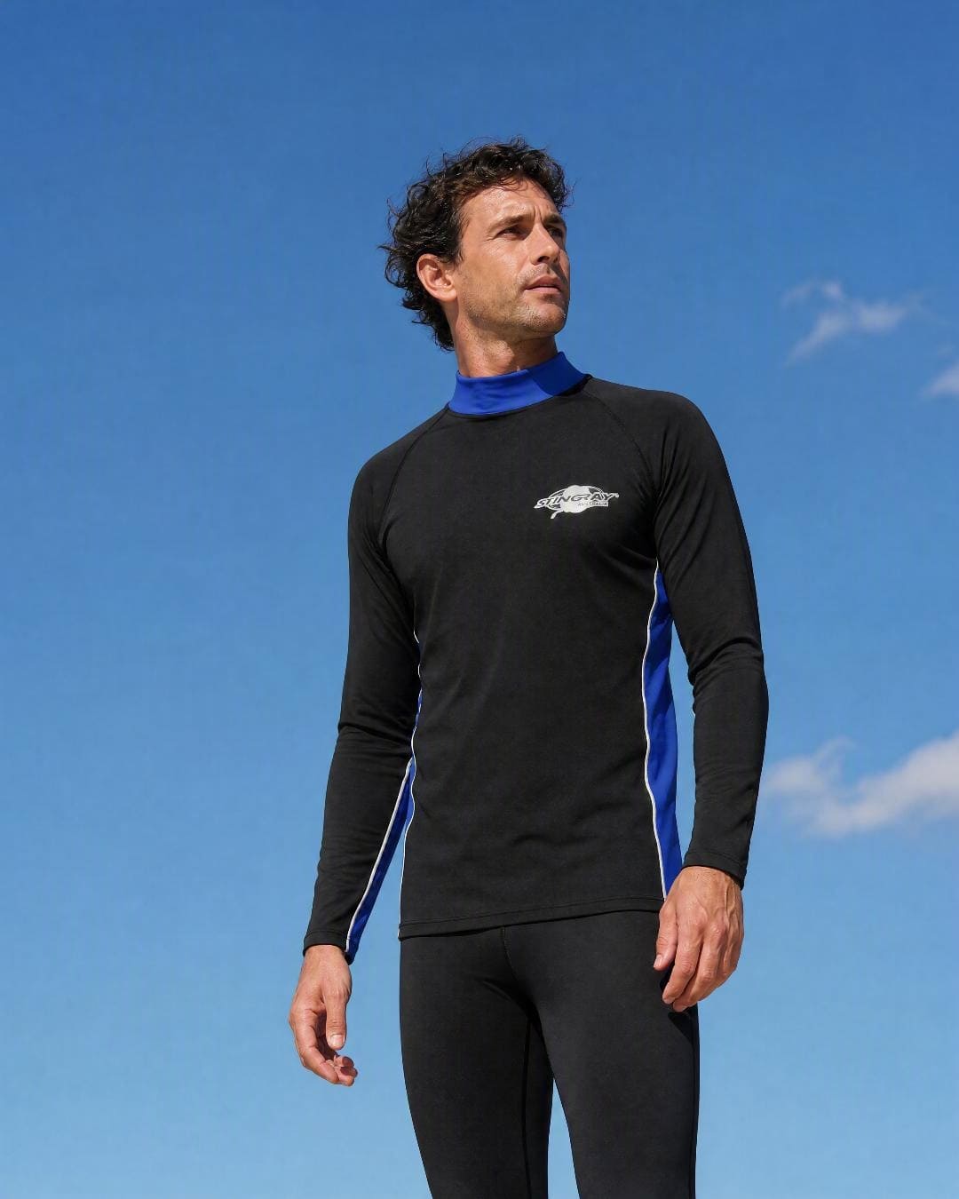 Lifestyle of Man Wearing Long Sleeve UV Swim Shirt UPF 50+ in Black Ocean Blue