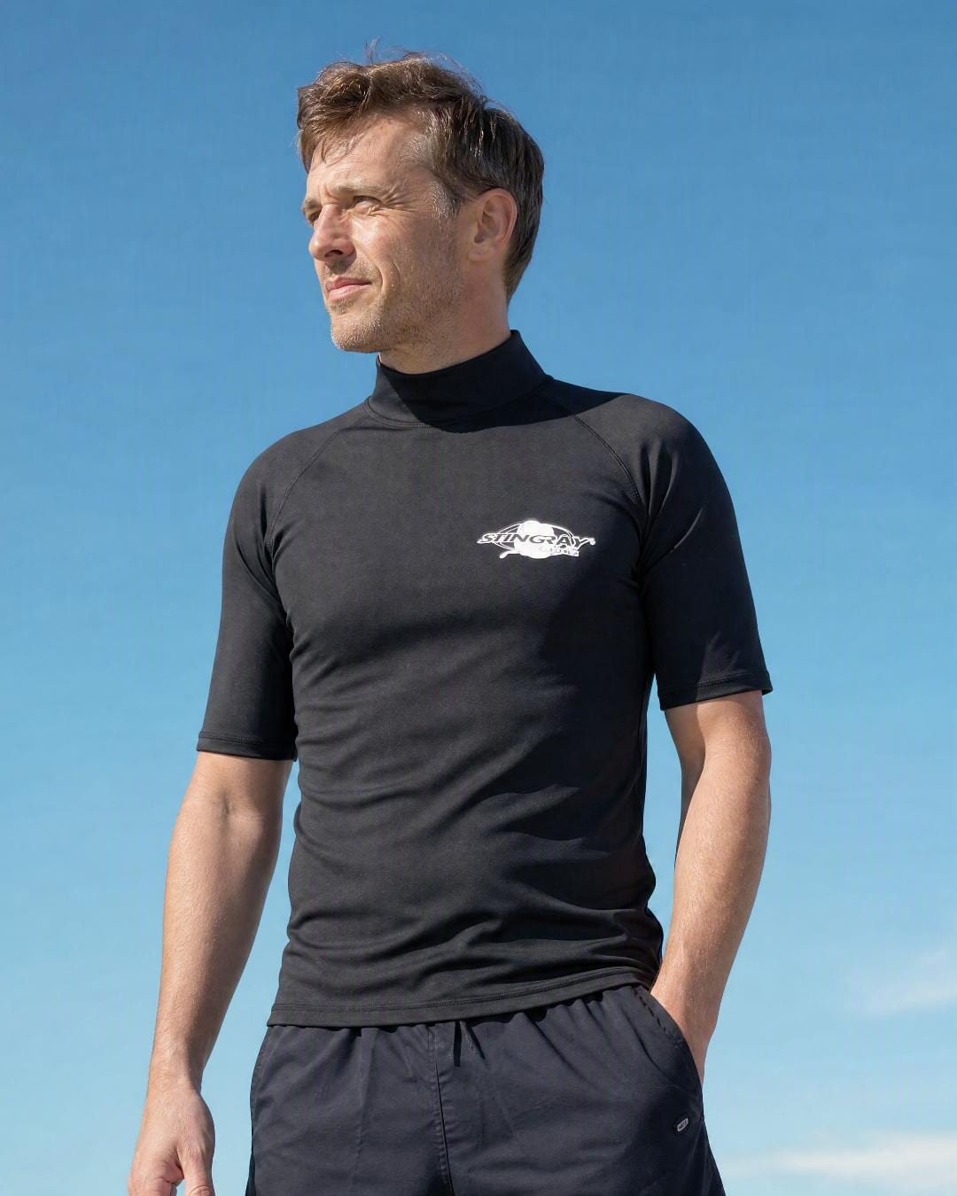 Lifestyle of Man Wearing Short Sleeve UV Swim Shirt UPF 50+ in Black