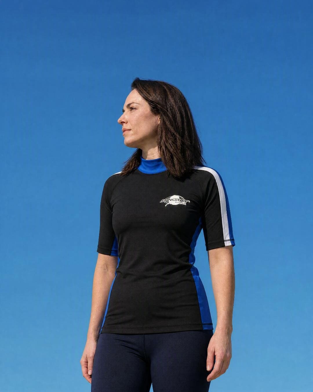 Lifestyle of Womens Black Ocean Blue White Short Sleeve UV Swim Shirt UPF 50+