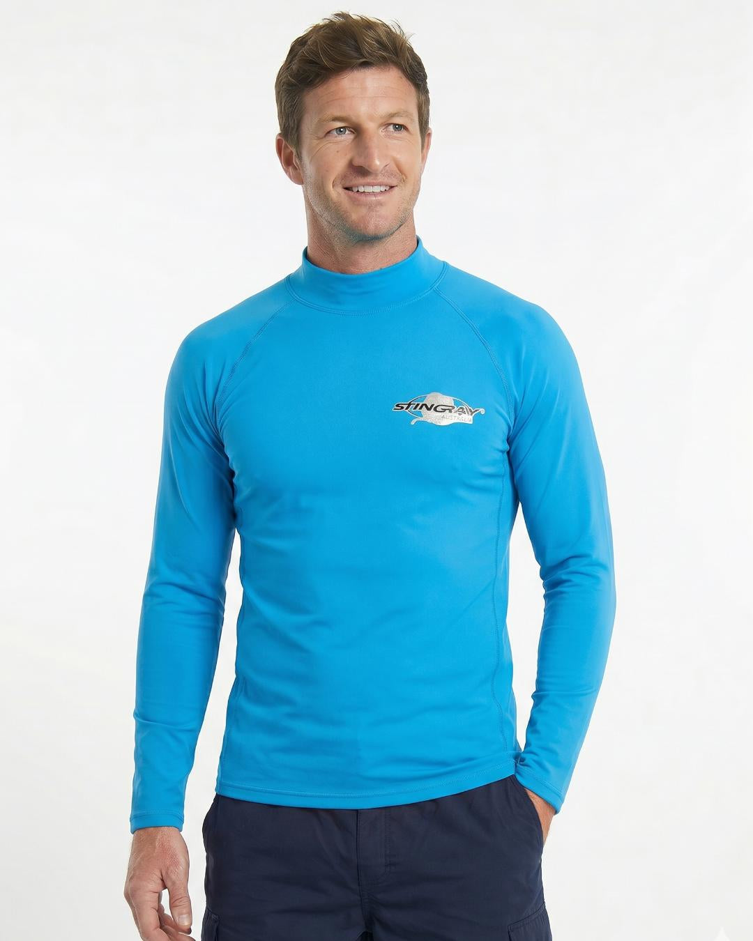 Man wearing an azure long-sleeve UV swim shirt UPF 50+ on a white background