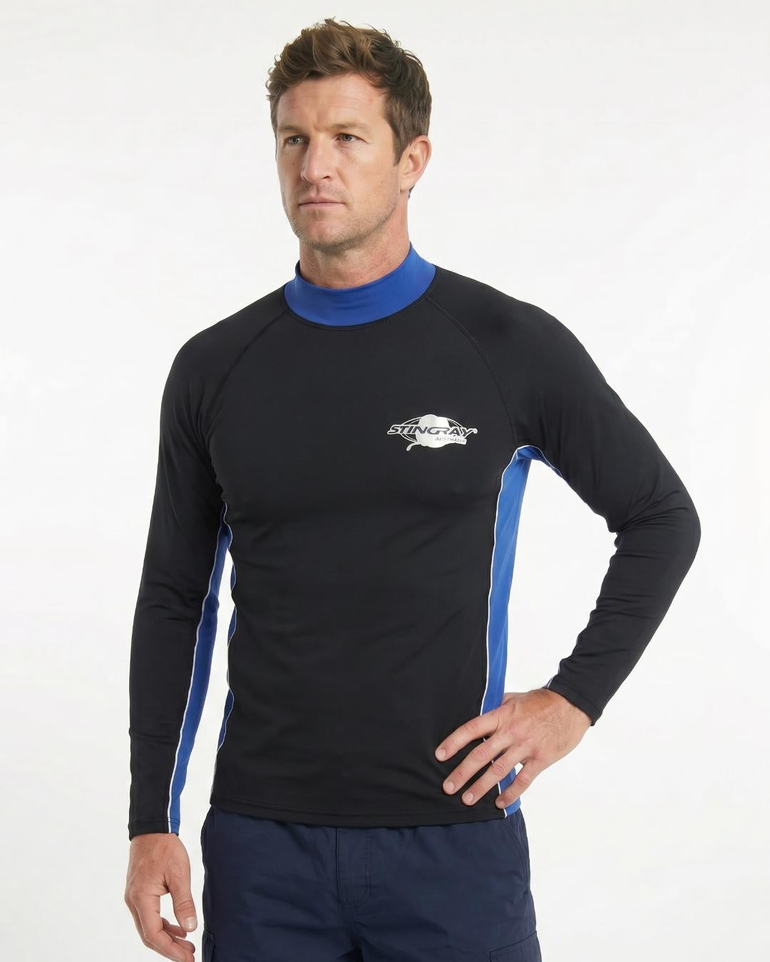 Man wearing a black and ocean blue long-sleeve UV swim shirt UPF 50+ on a white background