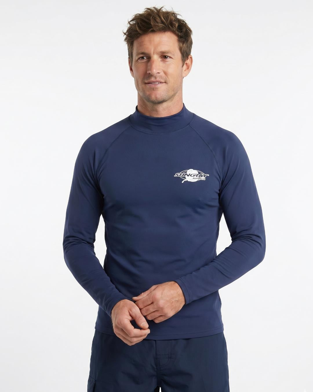 Man wearing a navy long-sleeve UV swim shirt UPF 50+ on a white background