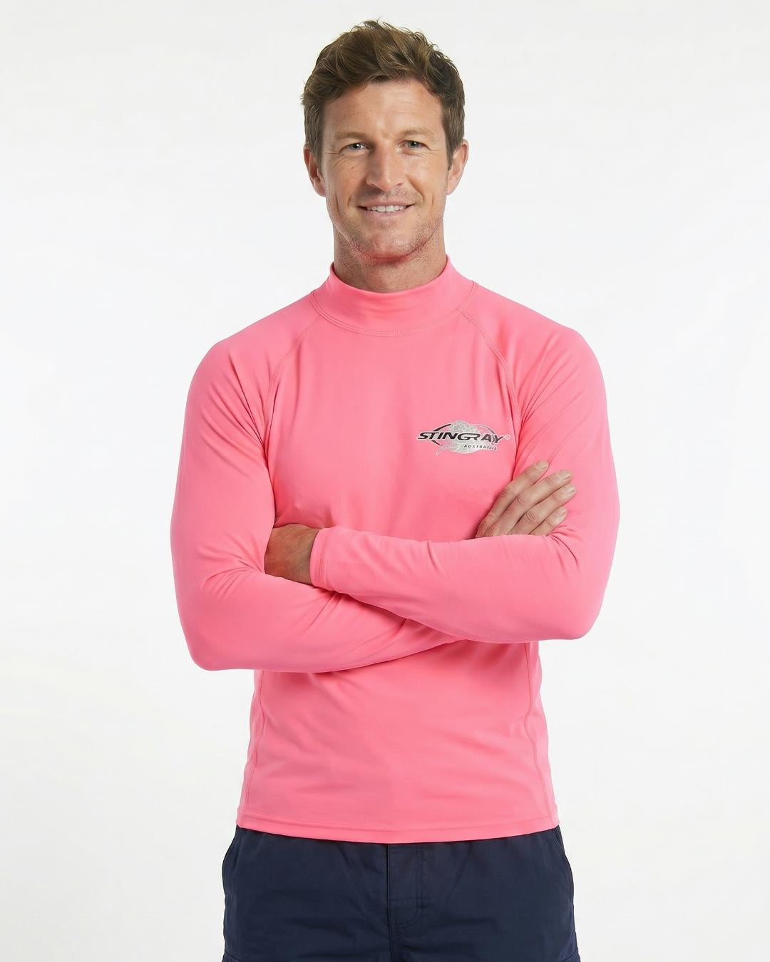 Man wearing a pink long-sleeve UV swim shirt UPF 50+ on a white background