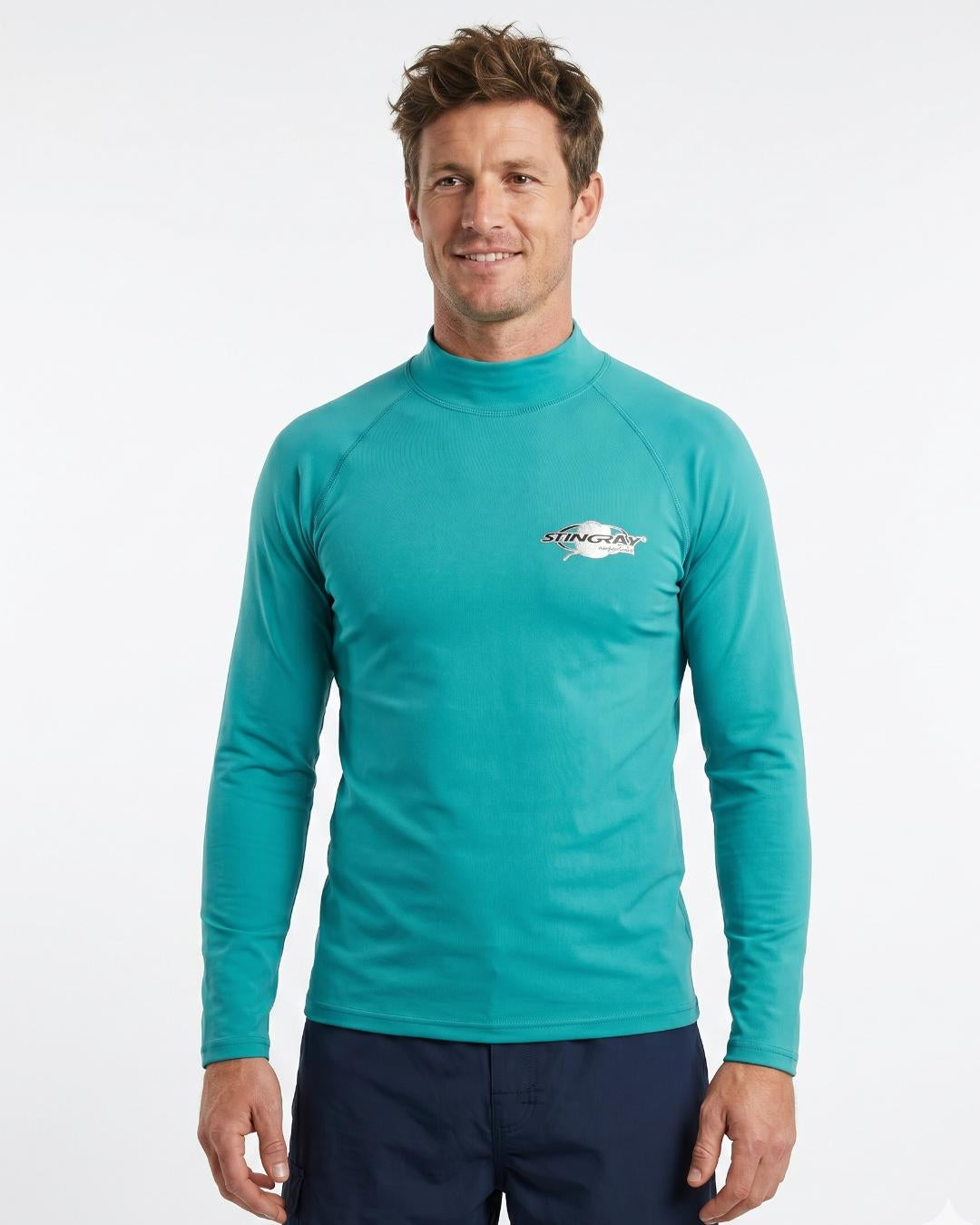 Man wearing a teal long-sleeve UV swim shirt UPF 50+ on a white background