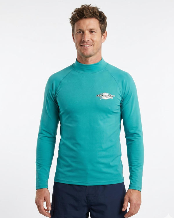 Man wearing a teal long-sleeve UV swim shirt UPF 50+ on a white background
