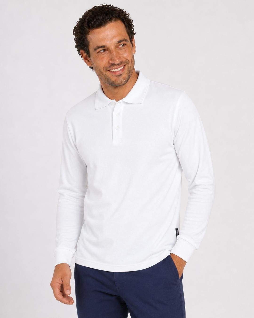 Man wearing a white long-sleeve UV polo shirt on a white background