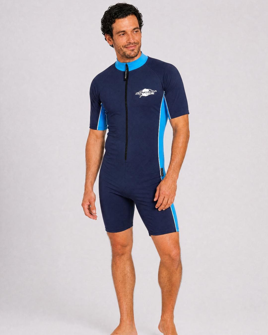 Man wearing a navy blue and azure UV full body swimsuit UPF 50+ on a white background