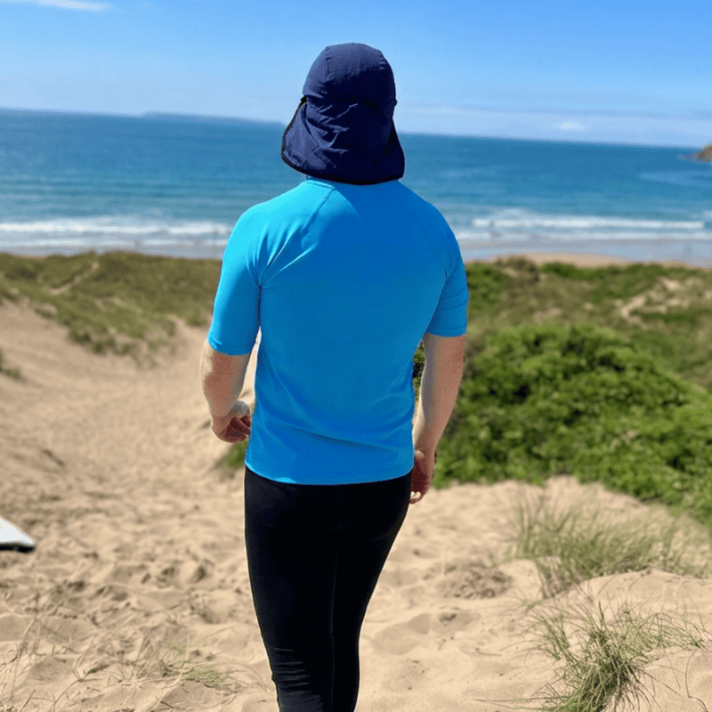 Man wearing UPF 50+ legionnaire sun hat that functions as a swim hat