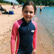 Review pic: 10 year old girl wearing full-body UV swimsuit at the beach