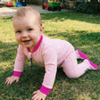 Review pic: baby crawling in UV sunsuit all-in-one romper