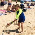 Review pic: child wearing a UV rash vest on the beach
