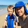 Review pic: man wearing UV legionnaire sun cap standing next to his child
