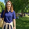 Review pic: pale woman wearing sun protective polo shirt (short sleeves)